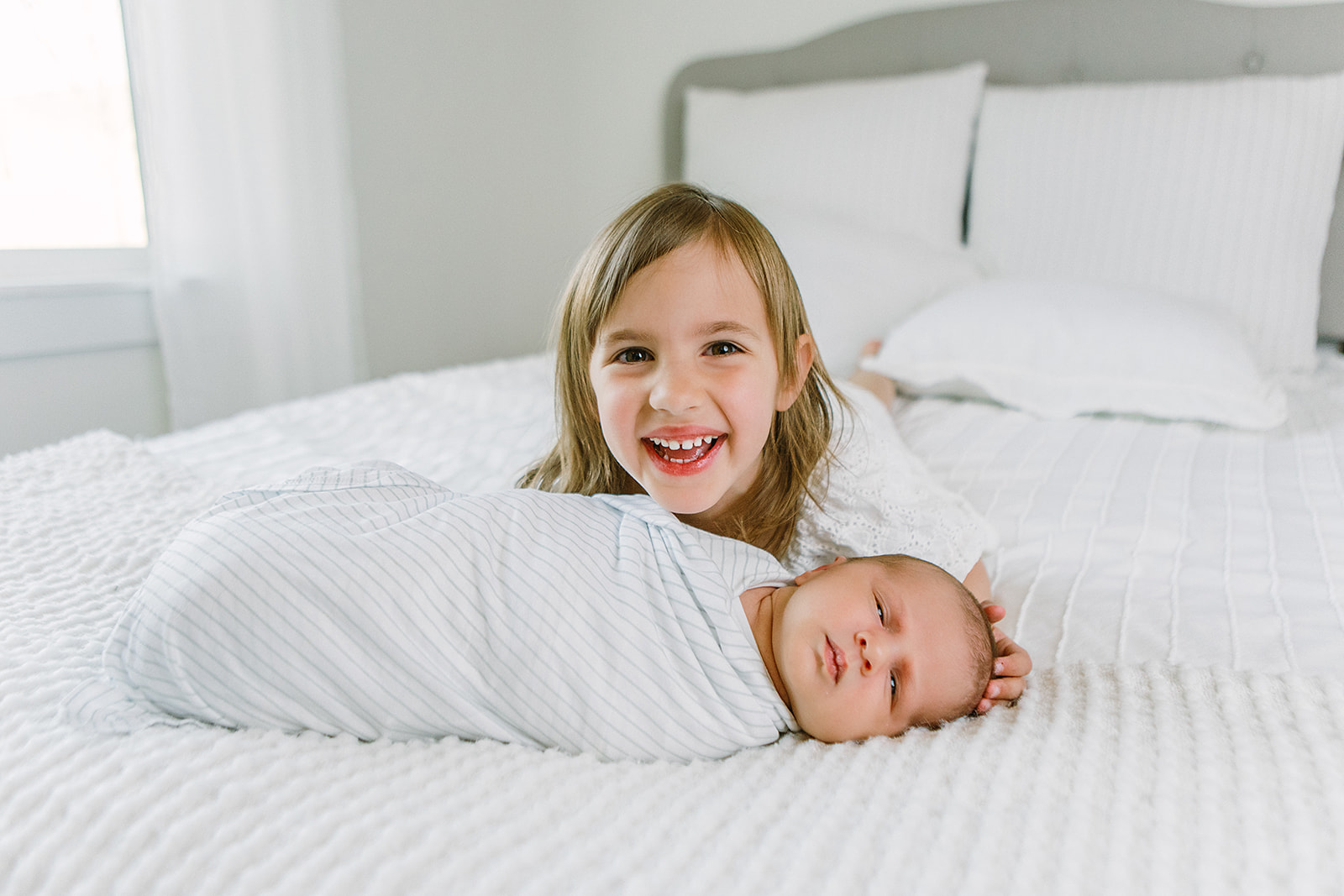 Lifestyle studio newborn session with family and baby boy in Meridian, Idaho.
