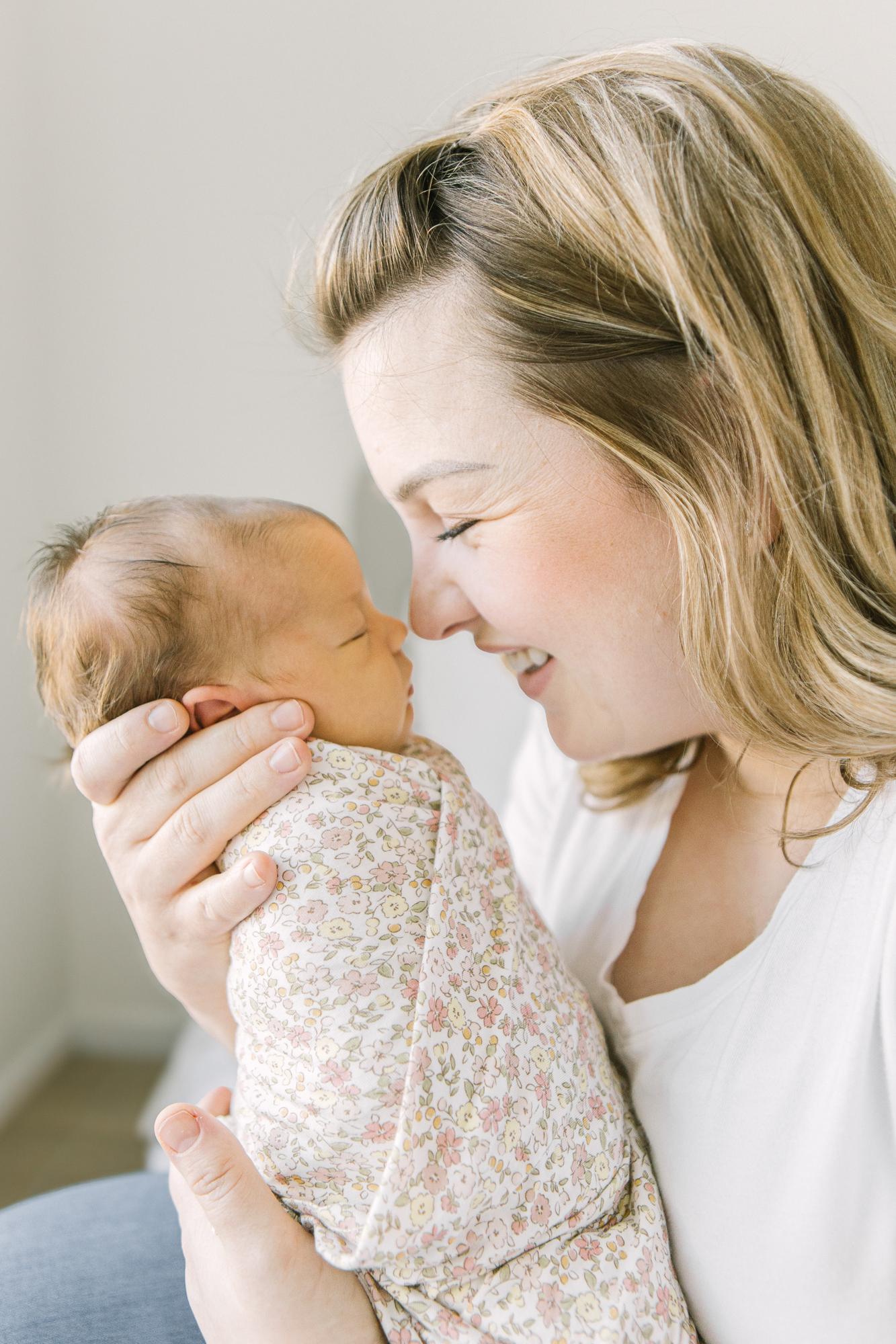 Candid moment of mom her baby, beautifully captured by Boise-based family photographer